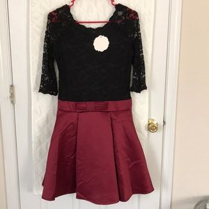 Black lacy top with red skirt size M